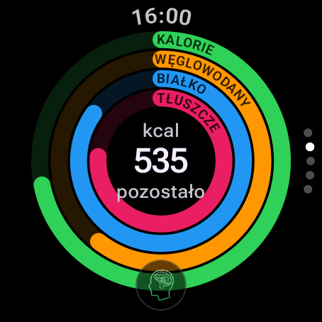 Licznik kalorii na Wear OS: cztery pierścienie makro dla kalorii, węglowodanów, białka i tłuszczu, zostało 535 kcal, oraz przycisk AI Coacha